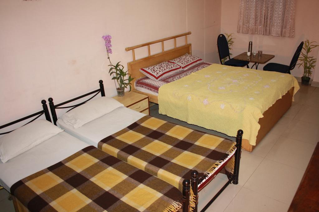 Minerva Residency Ξενοδοχείο Μπανγκαλόρ Δωμάτιο φωτογραφία